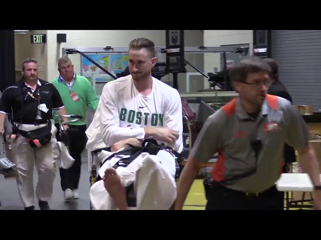 Boston Celtics forward Gordon Hayward is wheeled out of the Q after breaking his leg