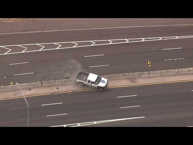 Truck flips during police chase