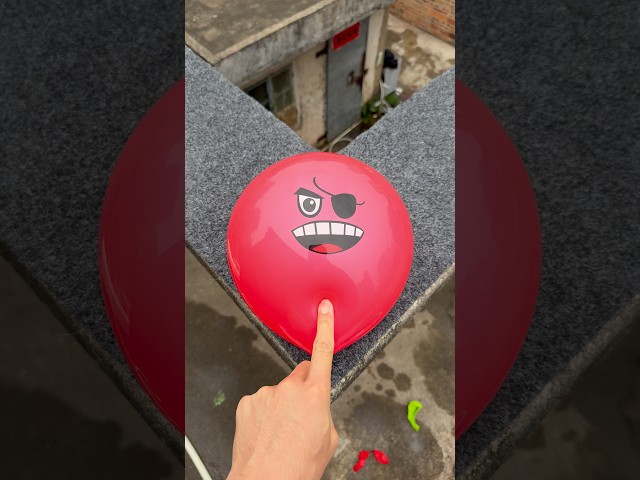Experiment: Will a water balloon explode if it rolls down a tall building? 💥🎈 #balloon
