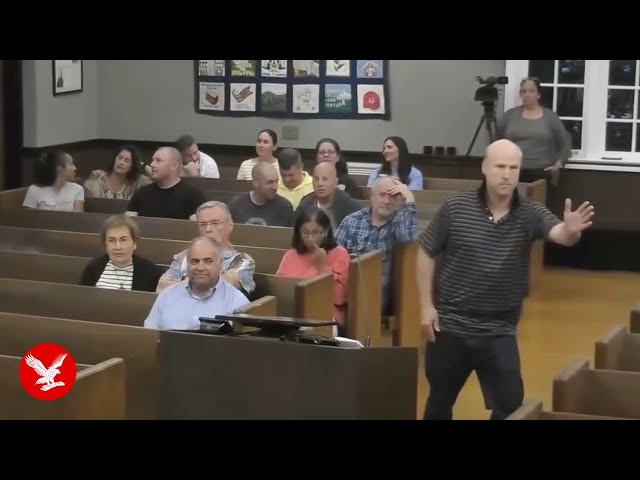 Awkward moment New Jersey man breakdances during town hall meeting