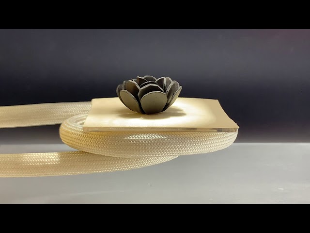 Tiny Magnetic Particles Enable New Material to Bend, Twist, and Grab