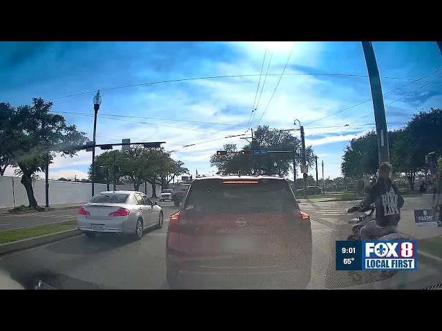 Video shows dirt bike rider allegedly fleeing police running red light before fatal Canal Bouleva...