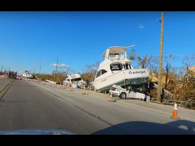 Boats thrown on to/near streets in Fort Myers After Hurricane. Crazy! 360 Video. Move around freely.