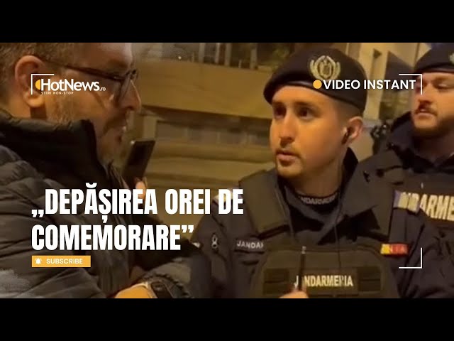 Momentul în care organizatorul marșului Colectiv este amendat de jandarmi