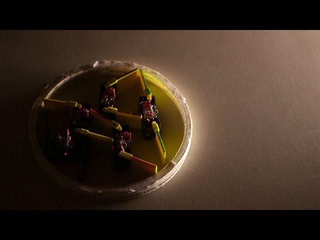 Smarticles: Robots Built from Smaller Robots Work Together