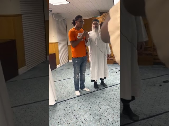 A new Muslim takes the Shahada!
