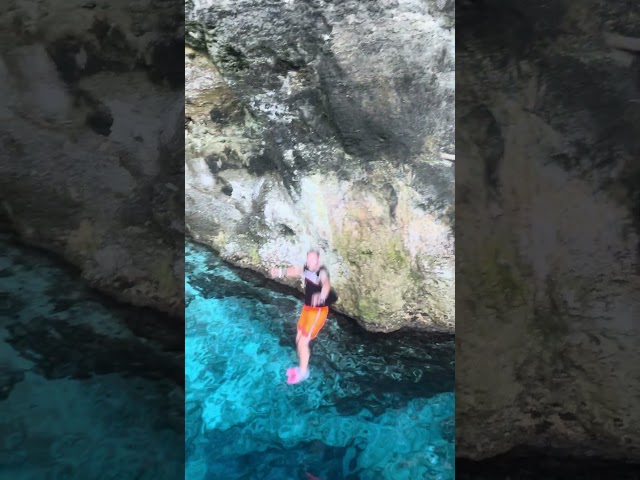 Jumping into the water caves at Scape Park, Punta Cana