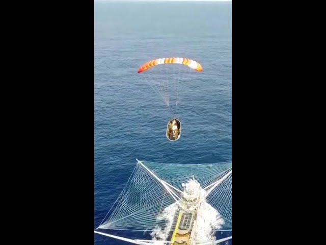 SpaceX’s fairing recovery vessel Ms. Tree catches a Falcon 9 fairing half