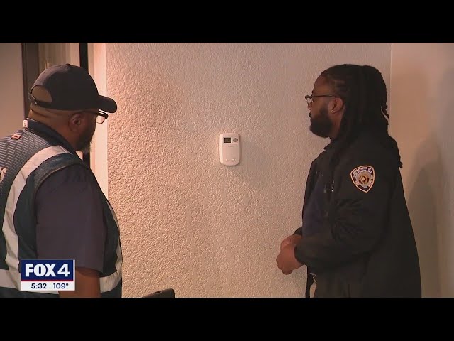 Dallas code compliance officers checking A/C units
