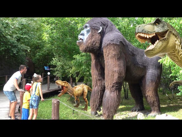 Sofia has fun in Dinosaur Park with her family