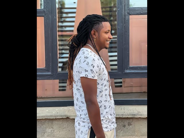 THEE PLUTO RETURNS HIS DREADLOCKS