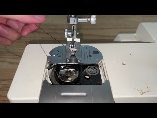 Singer 5830C Sewing Machine: Loading The Bobbin
