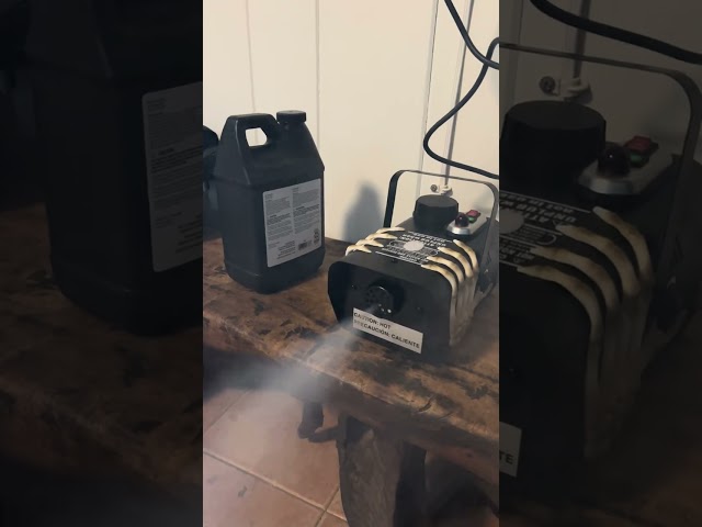 Testing out the smoke machine before goth night