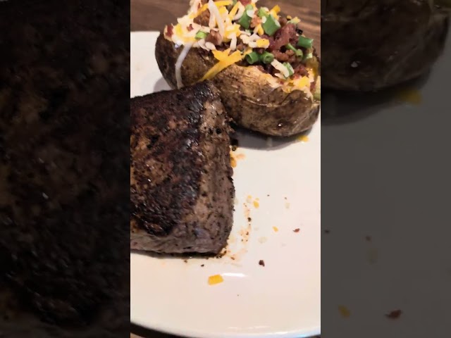 outback steak house 8oz sirloin cooked rare with baked potato perfectly done!