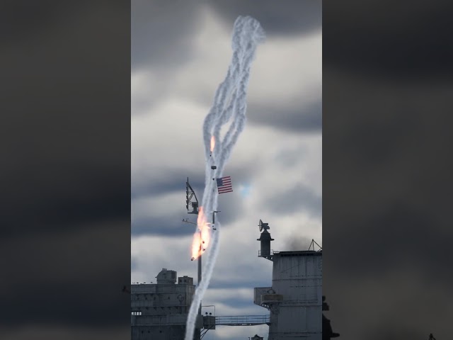 missile barrage dives toward massive US warship!