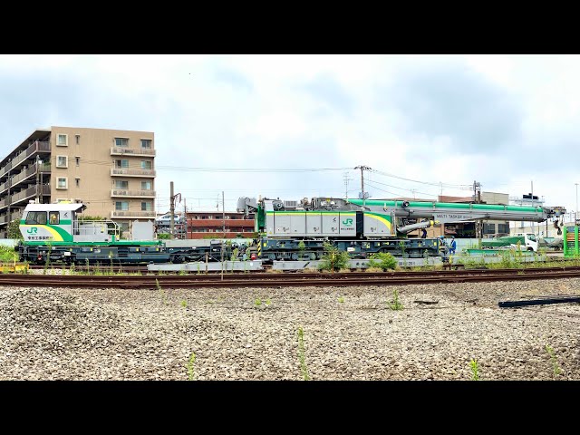 [VR180] VR shot of a rare MULTI TASKER 810N-2 railroad crane car parked at a stop.