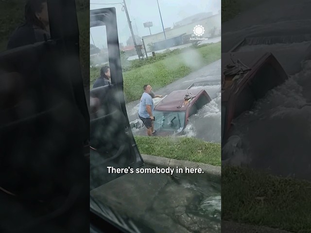Man Risks Life to Save Truck Driver Trapped in Flooding