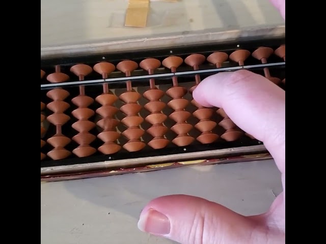 Computing sin(0.5 radians) on an abacus to 3 decimal places